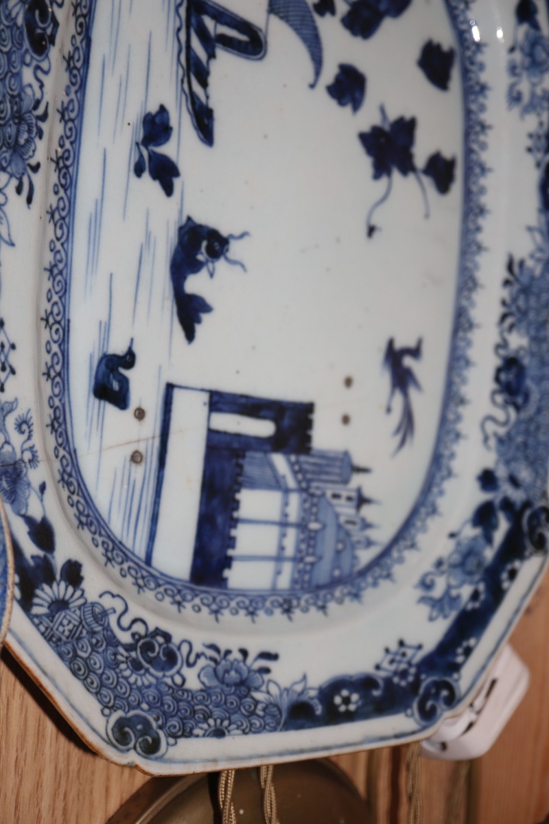 An 18th century Chinese blue and white octagonal dish and three Staffordshire pottery dishes, length 44cm